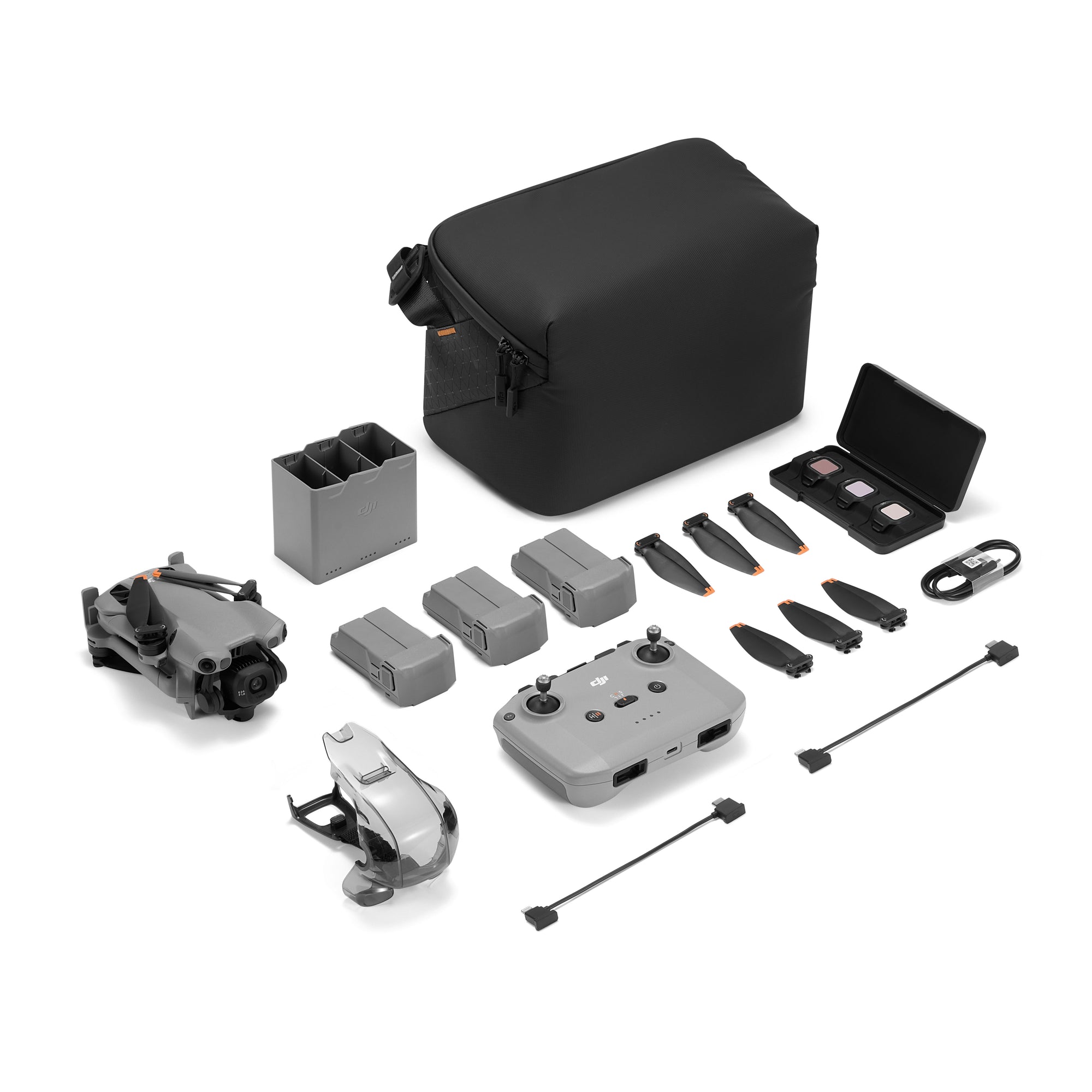 Everything included with the DJI Mini 5 Pro RC-N3 Fly More Combo, displayed at an angle.