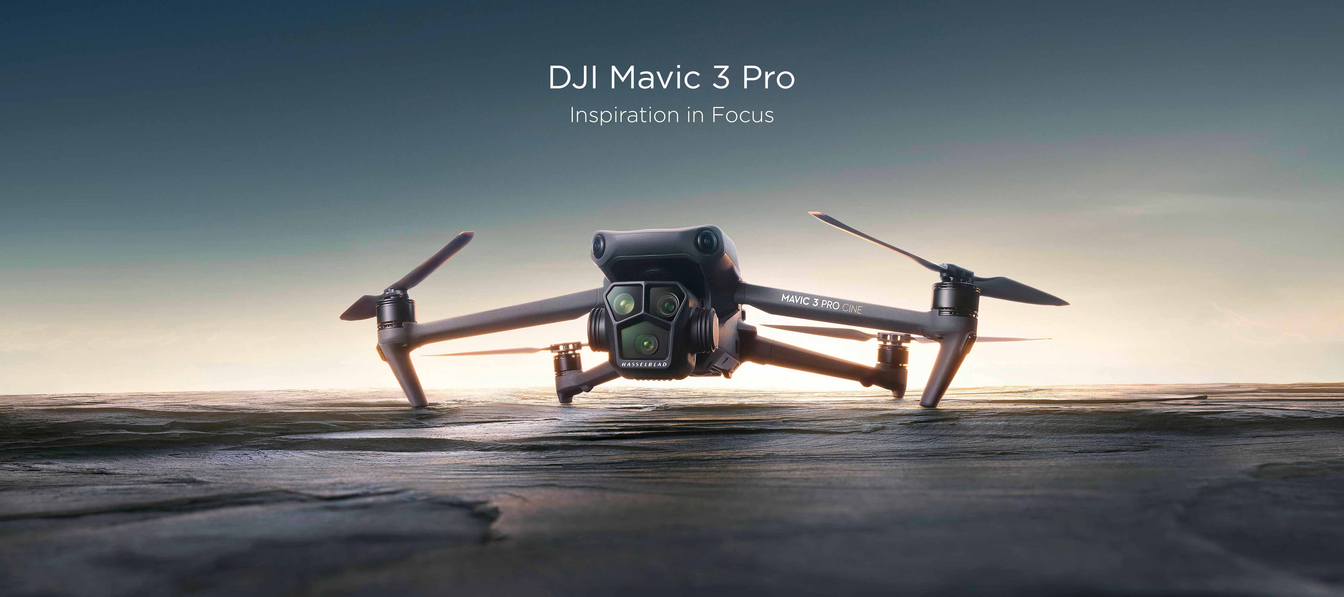 The DJI Mavic 3 Pro Cine resting on a rocky service during sunrise.