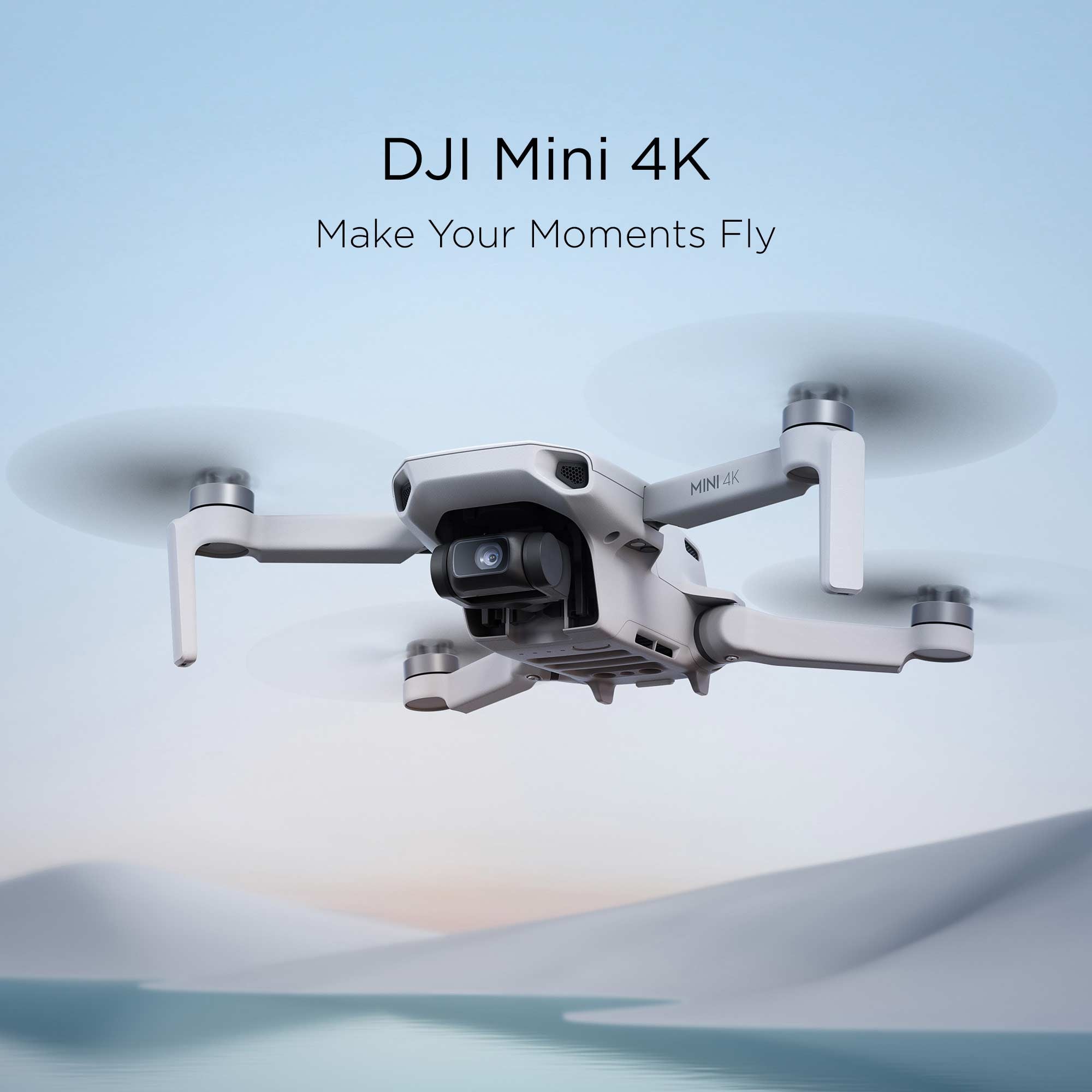 A DJI Mini 4K hovering with a blue background.