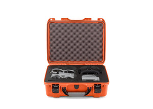 A front, top-down angled view of the the orange Nanuk Case 930 for DJI Avata 360 Fly More Combo with the drone and accessories displayed inside.
