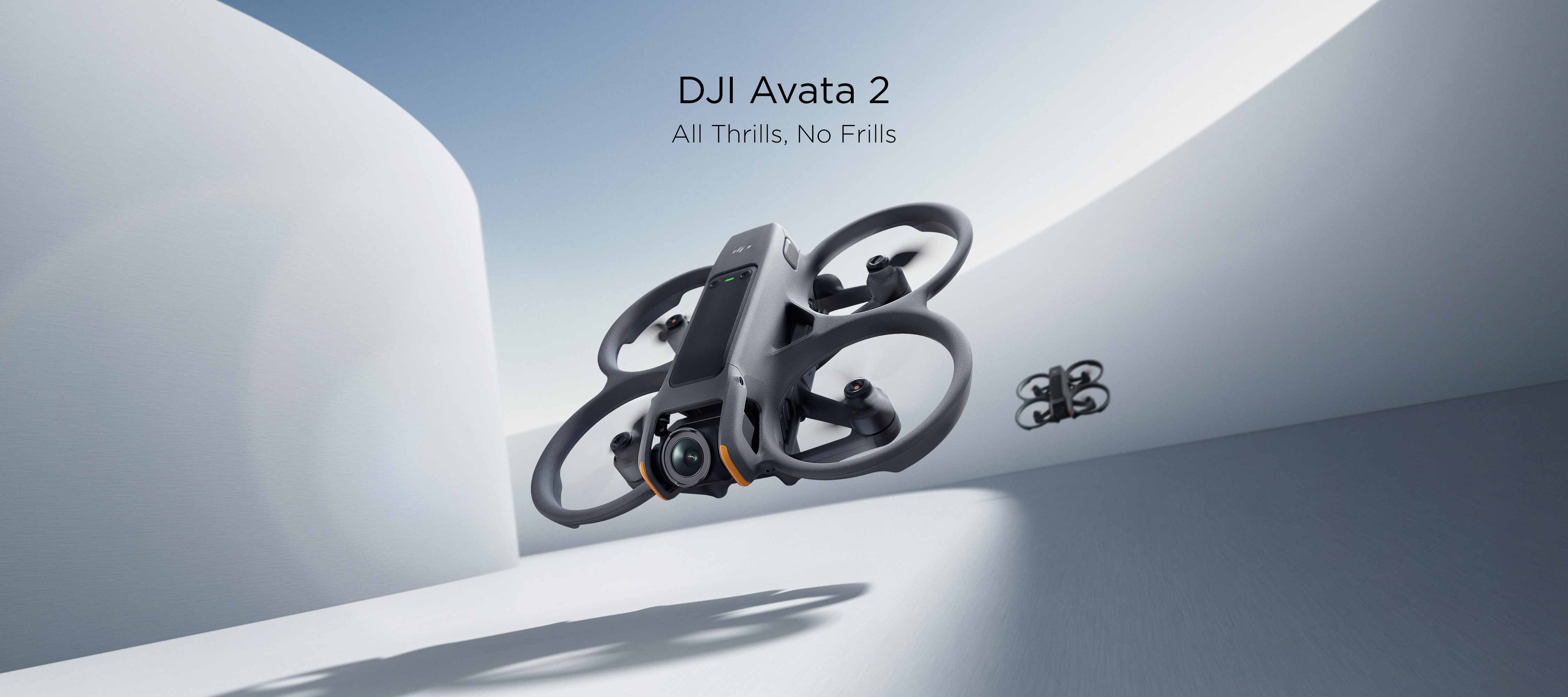 A DJI Avata 2 flying forward with another DJI Avata 2 chasing behind it.